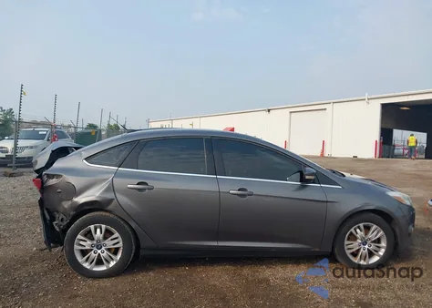 2012 Ford Focus Sel z USA, uszkodzony, nr VIN 1FAHP3H21CL437861